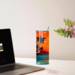 This photo shows the tumbler sitting on a desk, beside a laptop and vase of flowers. ideal for workdays
